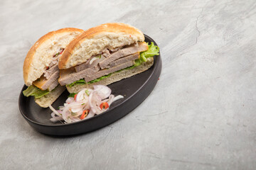 Butifarra traditional peruvian sandwich made of artisanal pork ham