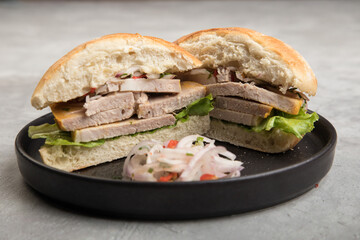 Butifarra traditional peruvian sandwich made of artisanal pork ham
