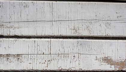 Weathered white painted wooden boards