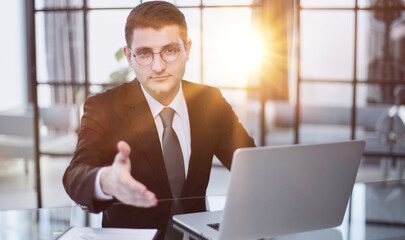 Caucasian middle-aged man, personnel manager at the table,