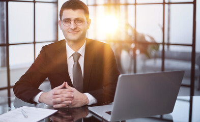 Business man thinking at laptop in office for startup management, strategy and agency.