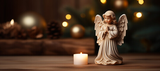 Christmas Tranquility: Praying Angel Statue by Candlelight - A Christian Symbol of Hope and Spiritual Reflection.