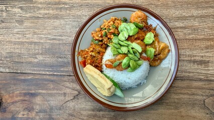 Sambal rice with fried shrimp, petai and other vegetables. Indonesian special food