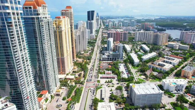 Sunny Isles Beach Florida. Panorama of Miami Beach FL. Atlantic Ocean beach. Beautiful seascape. Turquoise color of sea water. Summer vacation in Florida. Aerial view on Hotels and Resorts on Island