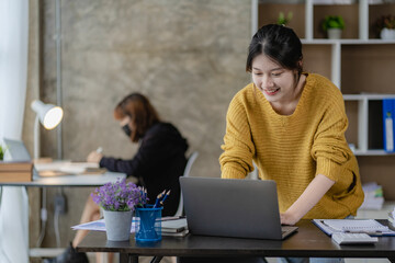 Asian man and woman meeting Asian Business Consultants to analyze and discuss financial report situation with digital tablet in conference room. investment advisor, collaboration concept