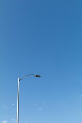 Street light pole with a blue sky