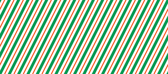 Candy cane seamless pattern. Green and red diagonal stripes background. Christmas repeating decoration texture. Winter holiday line backdrop. Xmas peppermint package wrapping print. Vector wallpaper - obrazy, fototapety, plakaty