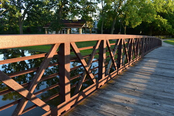 Fototapeta na wymiar Walking across Fox River on Bridge in Burlington, Wisconsin in Summer