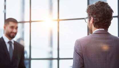 High angle of one young caucasian businessman from the back