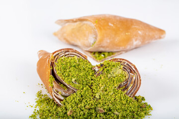 Turkish pestil amulet with pistachio. (Gaziantep Muska - Fistik Muskasi). Traditional amulet fruit...