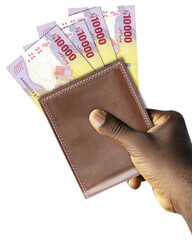 Black Hand Holding brown wallet With Central African CFA franc notes.