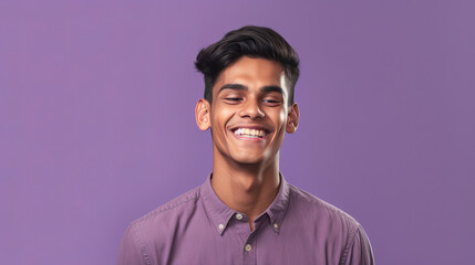 Obraz premium Smiling indian young man on lilac background. Generative Ai