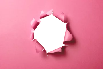 Foto auf Leinwand 穴の空いたピンク色の紙の背景テクスチャー © hanahal