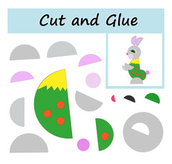 Educational paper game for kids. Cut parts of the image and glue on the paper. Cartoon hare.