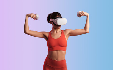 Strong sportswoman in VR headset showing biceps