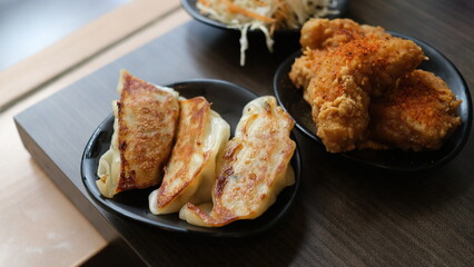 Set menu appetizer of japanese gyoza and chicken karage.