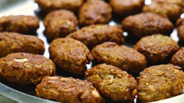  fried Raw Koftas, pakoda for the vegetable  Kofta curry an Indian Food, 4k, Close up shot 