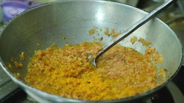  frying masala in kadai for the vegetable  Kofta curry an Indian Food, 4k, Close up shot 