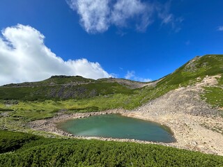 Mount Norikura (Norikura-dake) is a potentially active volcano located on the borders of Gifu and Nagano prefectures in Japan. It is part of the Hida Mountains and is listed among the 100 Famous Japan
