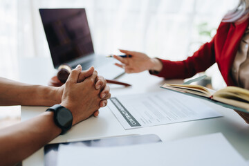 The lawyer with a client discussing contract paper, a Business lawyer working about legal legislation in the courtroom to help their customer, contract and agreement concept.