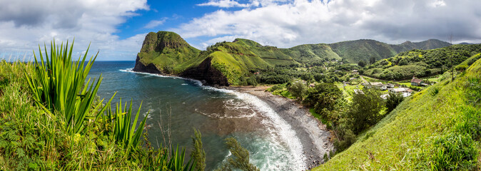 Panorama of Hawaii's landscape of cliff and beach