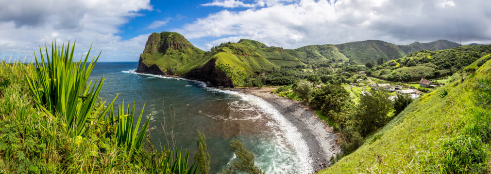 Panorama of Hawaii's landscape of cliff and beach