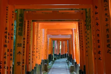 Foto op Canvas The Shrine of the Thousand Torii Gates. Fushimi Inari Shrine. It is famous for its thousands of vermilion torii gates. Japan © Argelis