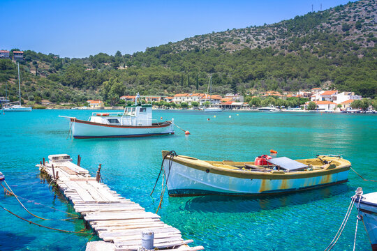Small fishing village of Posidonio with turquoise blue Aegean sea on Samos island, Greece