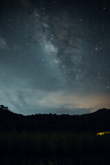 Milky way and bonfire at night