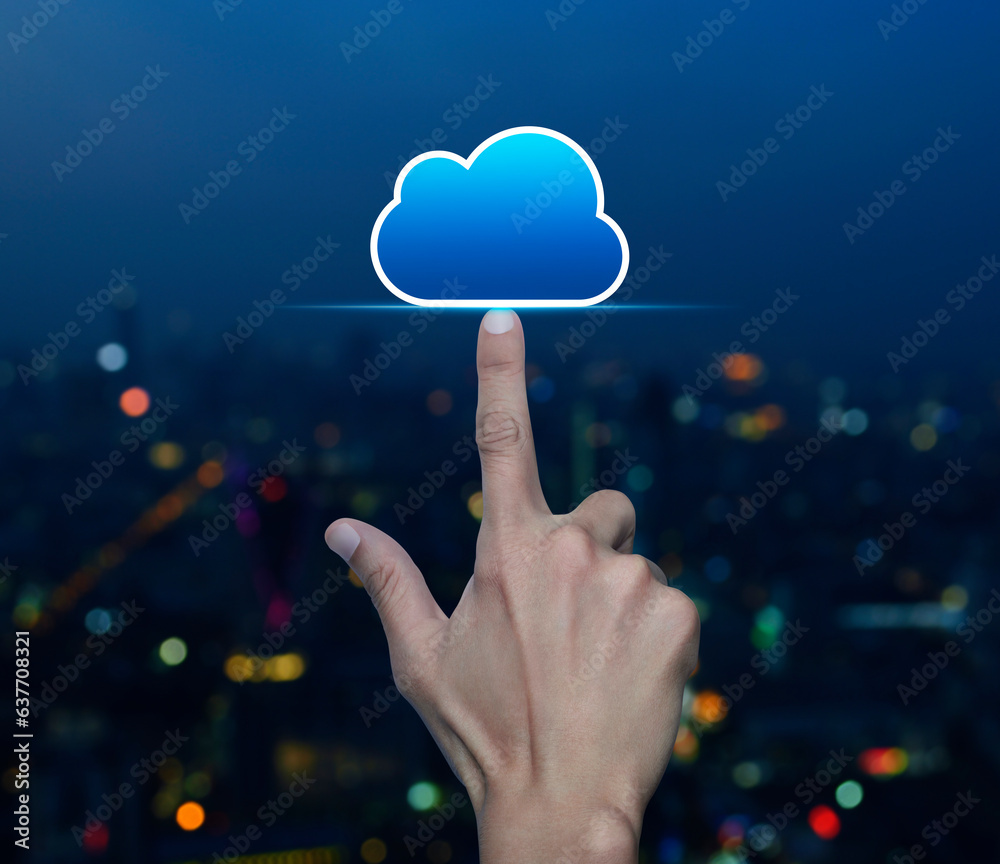 Poster hand click on cloud computing icon with copy space over blur colorful night light modern city tower 