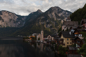 Fototapeta na wymiar Hallstat austria village. Small famous, romantic alps city on lake shore