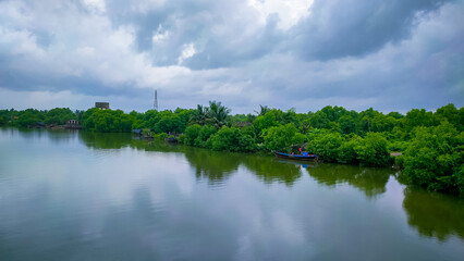 Fototapeta na wymiar Beautiful scenery at the river in rainy season.