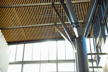 metal steelcolumn in modern building, fixing column and ceiling or roof, construction. shopping mall, airport