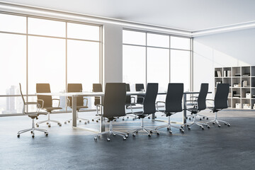 Perspective view of spacious empty conference room with office desk and chairs, window with city view, white walls and concrete floor. 3D Rendering