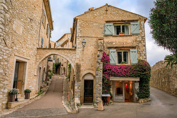 Traditional old stone houses on a street in the medieval town of Saint Paul de Vence, French Riviera, South of France