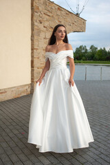 Fototapeta premium Fashion bride in wedding dress. Summer wedding