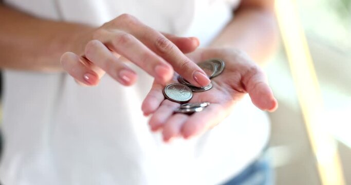 Woman hands count Georgian coins. Financial crisis and poverty