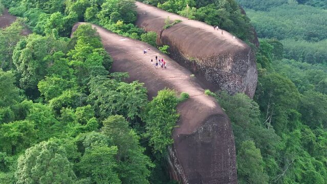 Drone shot of beautiful mountain looks like whale and camera  spinning around  three whale stones.