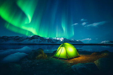 Outdoor adventure camping in mountain, tent in the snow and northern aurora light, generative ai