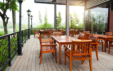 Outdoor cafe with wooden furniture