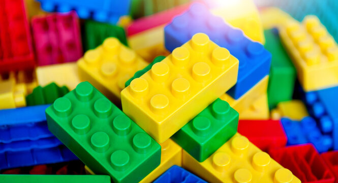 Large group of plastic toy blocks for background