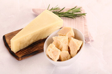 Chopped Italian hard parmesan cheese