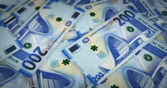 Azerbaijan Manat growing pile of money. AZN banknotes loop rotaring. Seamless and looped background concept of finance, economy crisis, inflation and business.
