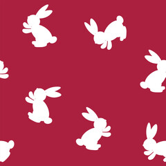 Seamless pattern with silhouette Easter rabbits on color background. Design for card, postcard, wallpaper, fabric, textile. Vector stock illustration. Cartoon style