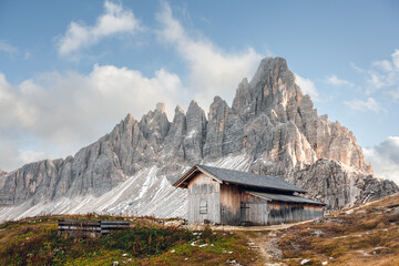 Wooden cabin at the Tre Cime di Lavaredo National Park near rifugio Locatelli in Dolomite Alps. Three peaks of Lavaredo, Dolomites, South Tyrol, Italy, Europe. Landscape photography - obrazy, fototapety, plakaty