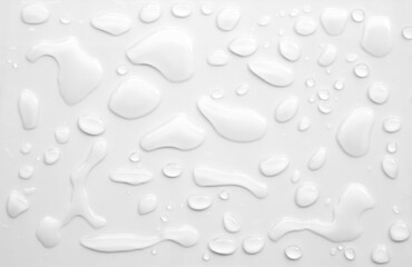 real image, top view spilled water drop on the floor isolated on white background