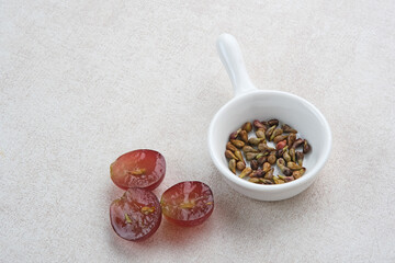 Biji Anggur, heap of grape seeds
