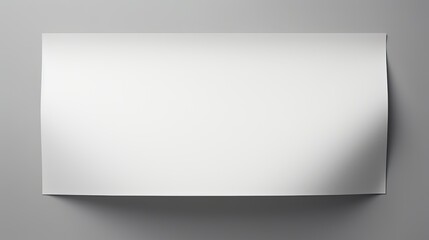 Gray background with folded blank paper. Mockup image