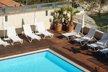 Fototapeta na wymiar A swimming pool in a luxury hotel in the Mediterranean sea region