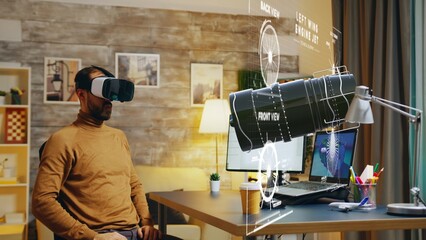 Specialist wearing VR headset using AR technology to visualize final result, prototyping jet engine...